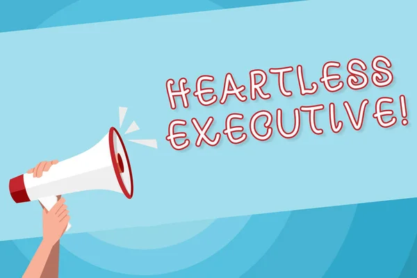 Text sign showing Heartless Executive. Conceptual photo workmate showing a lack of empathy or compassion Human Hand Holding Tightly a Megaphone with Sound Icon and Blank Text Space.