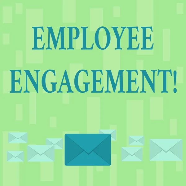 Handwriting text Employee Engagement. Concept meaning relationship between an organization and its employees Pastel Color Closed Envelopes in Different Sizes with Big one in the Middle.