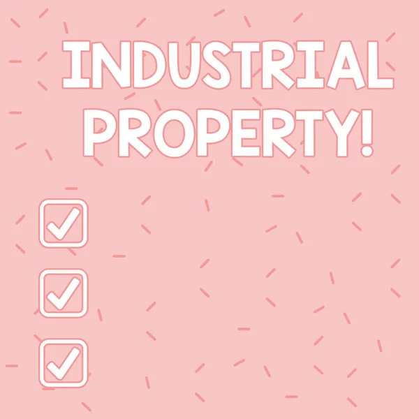 Text sign showing Industrial Property. Conceptual photo the intangible ownership of a trademark or patent Pink Tiny Sprinkles Confetti Scattered in Random on Lighter Shade Backdrop.