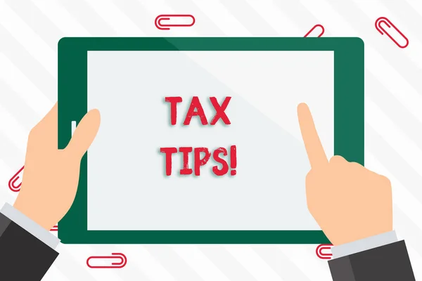 Text sign showing Tax Tips. Conceptual photo compulsory contribution to state revenue levied by government Businessman Hand Holding, Pointing and Touching Colorful Tablet Blank Screen.