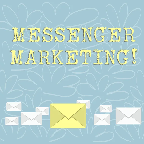 Writing note showing Messenger Marketing. Business photo showcasing act of marketing to your customers using a messaging app Color Envelopes in Different Sizes with Big one in Middle.