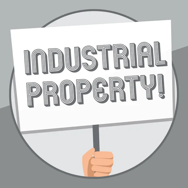 Word writing text Industrial Property. Business concept for the intangible ownership of a trademark or patent Hand Holding Blank White Placard Supported by Handle for Social Awareness. — 스톡 사진