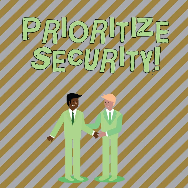 Word writing text Prioritize Security. Business concept for designate security risk as more important to solve Two Businessmen Standing, Smiling and Greeting each other by Handshaking. — 스톡 사진