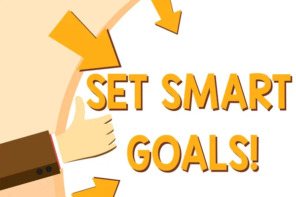 Writing note showing Set Smart Goals. Business photo showcasing list to clarify your ideas focus efforts use time wisely Hand Gesturing Thumbs Up and Holding Round Shape with Arrows. — 스톡 사진