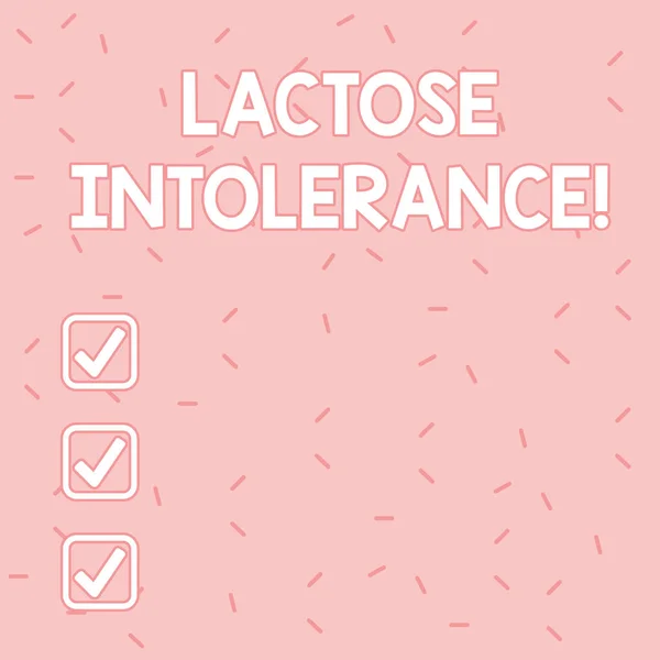 Text sign showing Lactose Intolerance. Conceptual photo digestive problem where body is unable to digest lactose Pink Tiny Sprinkles Confetti Scattered in Random on Lighter Shade Backdrop.