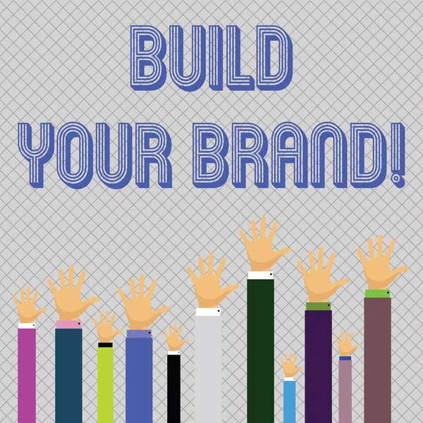 Text sign showing Build Your Brand. Conceptual photo creates or improves customers knowledge and opinions of product Hands of Several Businessmen Raising Up Above the Head, Palm Facing Front. — стокове фото