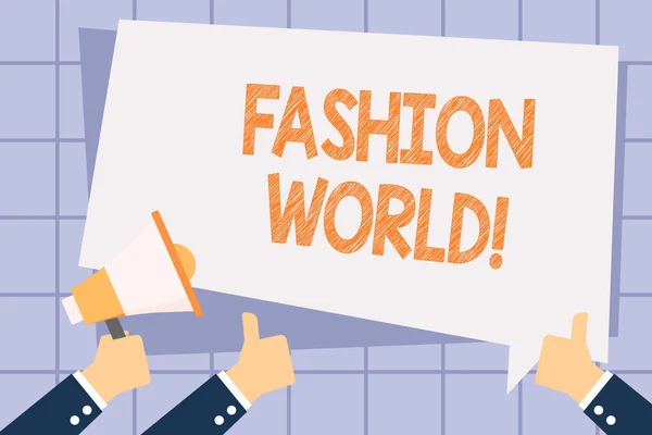 Escribiendo nota mostrando Fashion World. Foto de negocios que muestra el mundo que implica estilos de ropa y apariencia de mano celebración de megáfono y gestos pulgares de texto Globo . — Foto de Stock