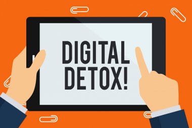 Kelime yazma metni Dijital Detox. Bir gösteri sırasında iş konsepti. İş adamı El Tutuşu, Gösterme ve Dokunma Renkli Tablet Boş Ekran.