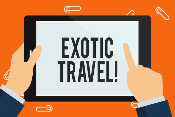 Word writing text Exotic Travel. Business concept for Travelling to unusual places or unfamiliar destination Businessman Hand Holding, Pointing and Touching Colorful Tablet Blank Screen. — ストック写真