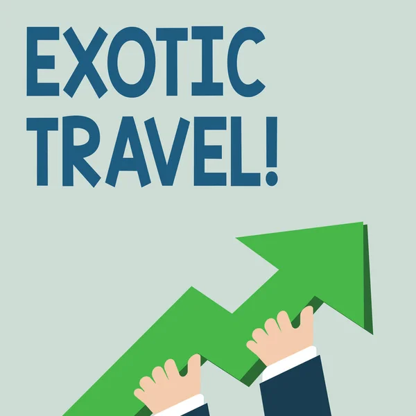 Word writing text Exotic Travel. Business concept for Travelling to unusual places or unfamiliar destination photo of Hand Holding Colorful Huge 3D Arrow Pointing and Going Up. — ストック写真