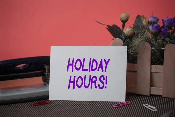 Conceptual hand writing showing Holiday Hours. Business photo text Overtime work on for employees under flexible work schedules.