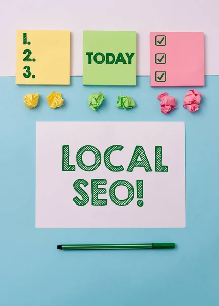 Writing note showing Local Seo. Business photo showcasing incredibly effective way to market your near business online Note papers and stationary placed sideways on top of softhued backdrop. — 스톡 사진