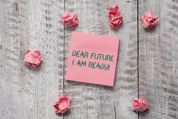 Writing note showing Dear Future I Am Ready. Business photo showcasing suitable state for action or situation being fully prepared Thick set of plain note paper with scraps on the wooden textured — 스톡 사진