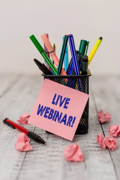 Writing note showing Live Webinar. Business photo showcasing presentation lecture or seminar transmitted over Web Writing equipment and paper scraps with blank sheets on the wooden desk. — 스톡 사진