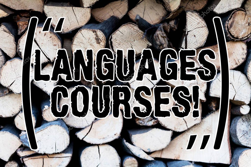 Handwriting text Languages Courses. Concept meaning set of classes or a plan of study on a foreign language Background dry chopped firewood logs stacked up in a pile winter chimney.
