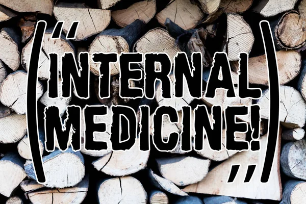 Handwriting text Internal Medicine. Concept meaning dedicated to the diagnosis and medical treatment of adults Background dry chopped firewood logs stacked up in a pile winter chimney.