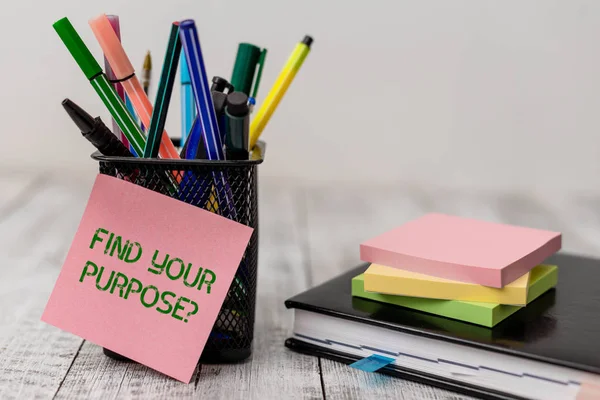 Handwriting text Find Your Purpose question. Concept meaning reason for something is done or for which exists Writing equipment and note paper sheets with agenda book on the wooden desk. — Stock Photo, Image