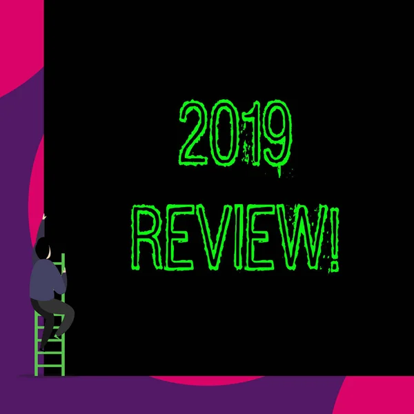 Handwriting text 2019 Review. Concept meaning remembering past year events main actions or good shows Back view young man climbing up staircase ladder lying big blank rectangle.