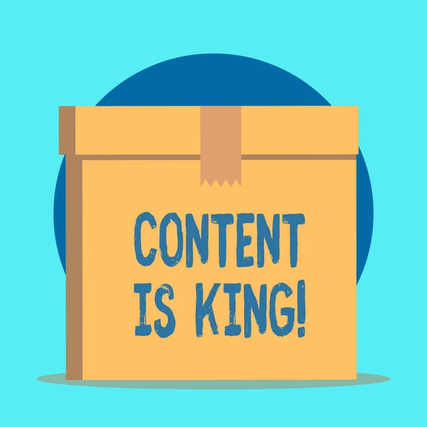 Writing note showing Content Is King. Business photo showcasing marketing focused growing visibility non paid search results Rectangular equal size hard carton cardboard with irregular zigzag tape. — 스톡 사진
