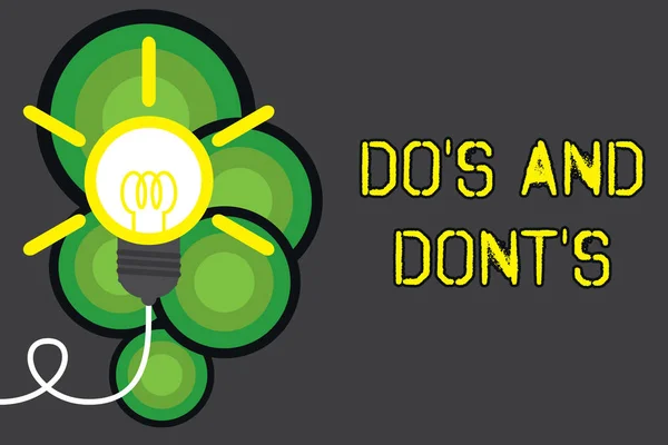 Text sign showing Do S Is And Dont S Is. Conceptual photo advising Rules or customs concerning some activity Big idea light bulb. Successful turning idea invention innovation. Startup. — Stock Photo, Image