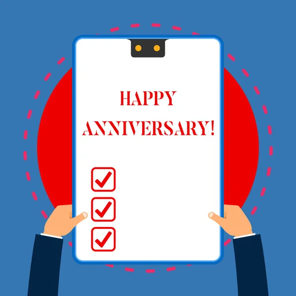 Handwriting text writing Happy Anniversary. Concept meaning The annually recurring date of a past event celebration White rectangle clipboard with blue frame has two holes holds by hands. — 스톡 사진