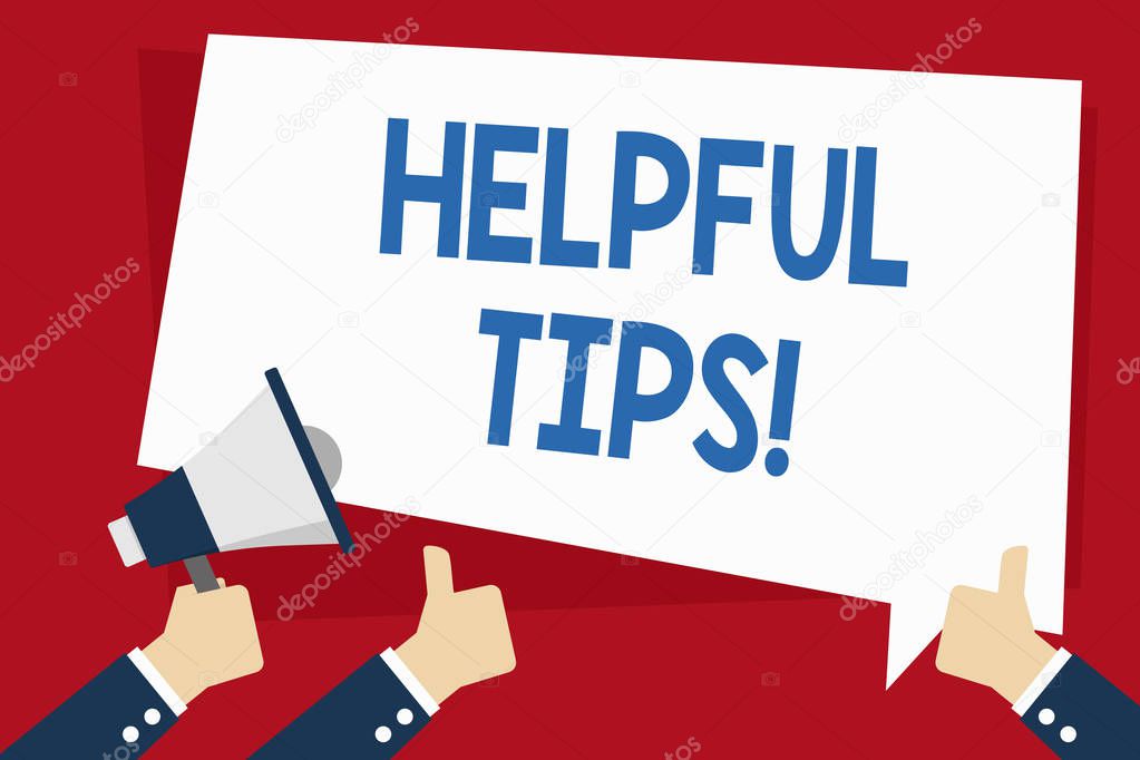 Word writing text Helpful Tips. Business concept for advices given to be helpful knowledge in life Hand Holding Megaphone and Other Two Gesturing Thumbs Up with Text Balloon.