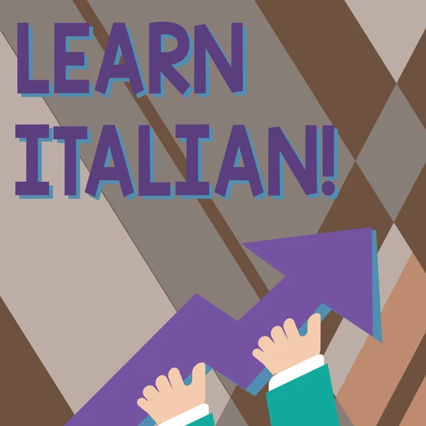 Handwriting text writing Learn Italian. Concept meaning gain or acquire knowledge of speaking and writing Italian photo of Hand Holding Colorful Huge 3D Arrow Pointing and Going Up.