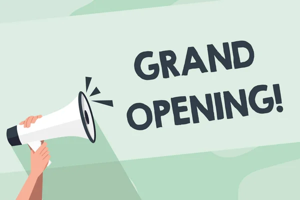 Word writing text Grand Opening. Business concept for held to mark the opening of a new business or public place Human Hand Holding Tightly a Megaphone with Sound Icon and Blank Text Space. — 图库照片