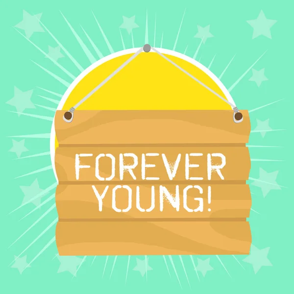 Signo de texto que muestra Forever Young. Conceptual foto mentalidad de un ser fresco y despreocupado no importa la edad Conectar en blanco placa de la muestra. Letrero de madera vacío con lope para colgar . — Foto de Stock