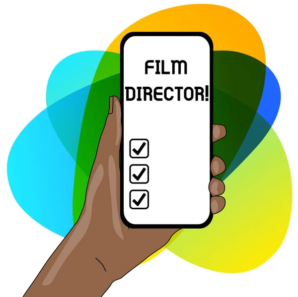 Word writing text Film Director. Business concept for a demonstrating who is in charge of making and directing a film Closeup of Smartphone Device Held in Hand with Empty Screen and Text Space. — Stock Photo, Image