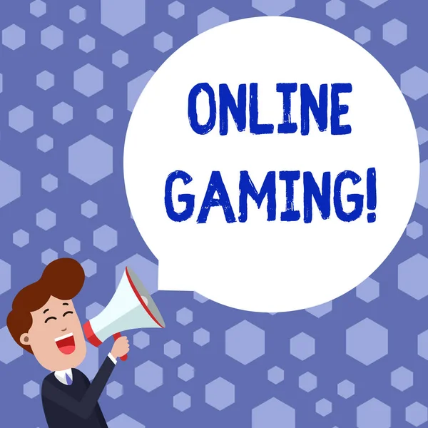 Text sign showing Online Gaming. Conceptual photo action or practice of playing video games on the internet Young Man Shouting into Megaphone Floating Round Shape Empty Speech Bubble.