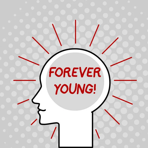 Writing note showing Forever Young. Business photo showcasing mindset of a being fresh and carefree no matter the age Outline Silhouette Human Head Surrounded by Light Rays Blank Text Space.