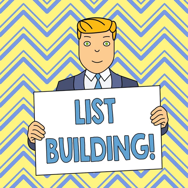 Word writing text List Building. Business concept for database of showing you can contact with your marketing message Smiling Man Holding Formal Suit Big Blank Poster Board in Front of Himself.