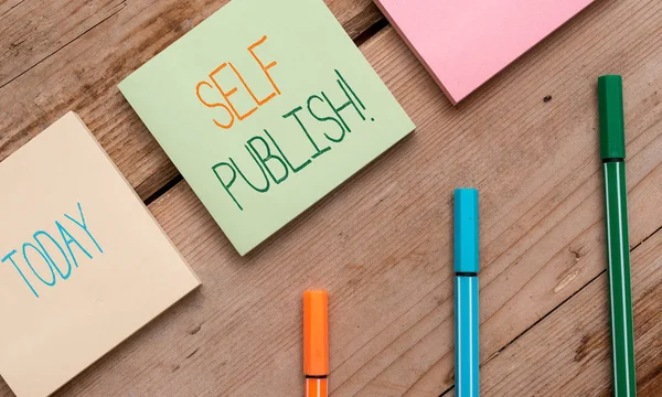 Text sign showing Self Publish. Conceptual photo writer publish piece of ones work independently at own expense Note papers and stationary placed sideways on top of softhued backdrop. — Stock Photo, Image