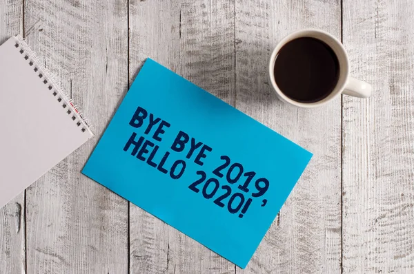 Slovo psaní text Ahoj 2019 Ahoj 2020. Obchodní koncept pro rozloučení s loňským rokem a přivítání další dobrý. — Stock fotografie
