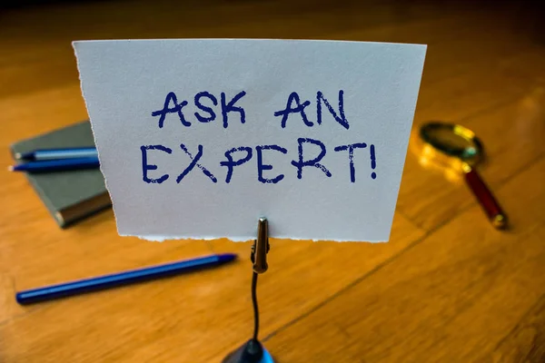 Writing note showing Ask An Expert. Business photo showcasing confirmation that have read understand and agree with guidelines Reminder paper base note rule pen magnifying glass electronic device. — 스톡 사진