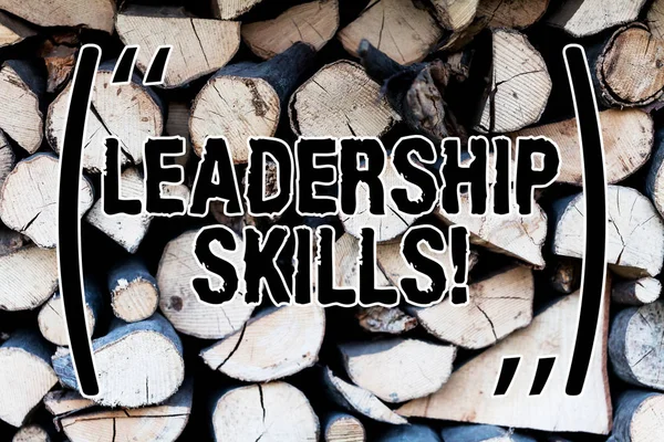 Handwriting text Leadership Skills. Concept meaning Skills and qualities that leaders possess Taking a lead Background dry chopped firewood logs stacked up in a pile winter chimney.