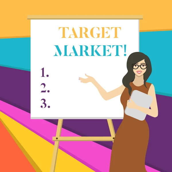 Word writing text Target Market. Business concept for Particular group of consumers which a product is aimed White Female in Glasses Standing by Blank Whiteboard on Stand Presentation.