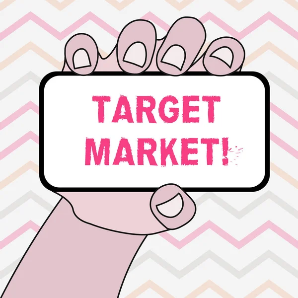 Text sign showing Target Market. Conceptual photo Particular group of consumers which a product is aimed Closeup of Smartphone Device Held in Hand with Blank Screen and Text Space.