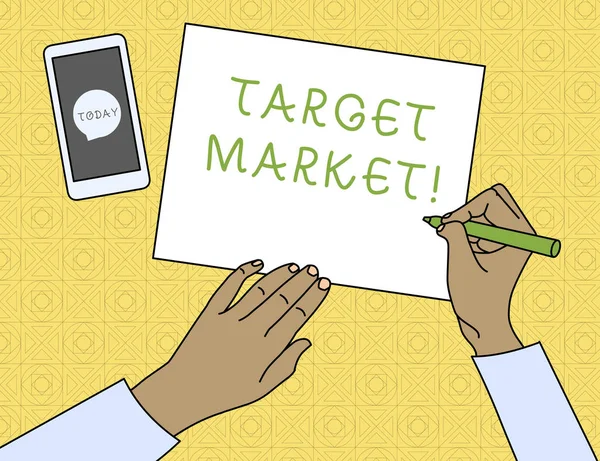 Conceptual hand writing showing Target Market. Business photo text Particular group of consumers which a product is aimed Top View Man Writing Paper Pen Smartphone Message Icon.