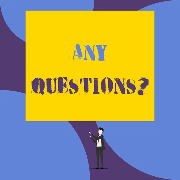 Text sign showing Any Questions Question. Conceptual photo you say write order to ask demonstrating about something Isolated view young man standing pointing upwards two hands big rectangle.