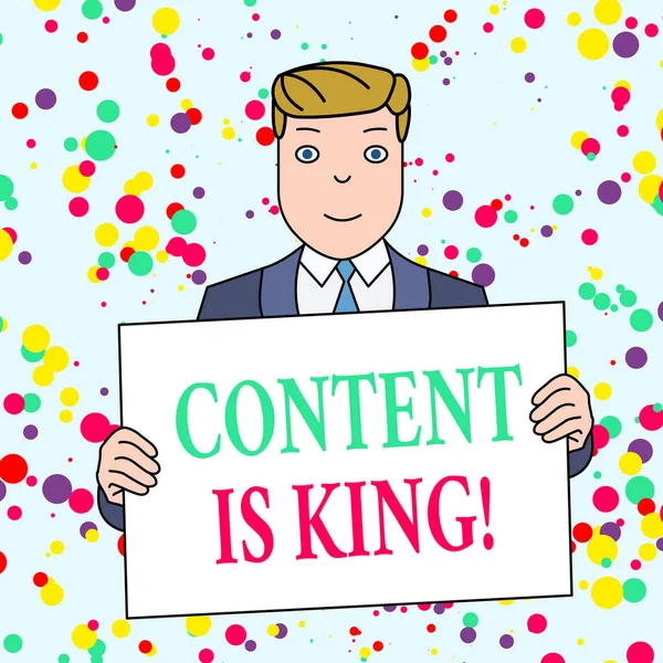 Text sign showing Content Is King. Conceptual photo marketing focused growing visibility non paid search results Smiling Man Holding Formal Suit Big Blank Poster Board in Front of Himself.
