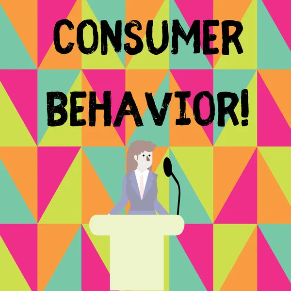 Word writing text Consumer Behavior. Business concept for study of how individual customers interacts with the brand Businesswoman Standing Behind Podium Rostrum Speaking on Wireless Microphone.