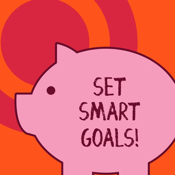 Handwriting text writing Set Smart Goals. Concept meaning list to clarify your ideas focus efforts use time wisely Side view big piggy bank with abstract geometrical background flat design.