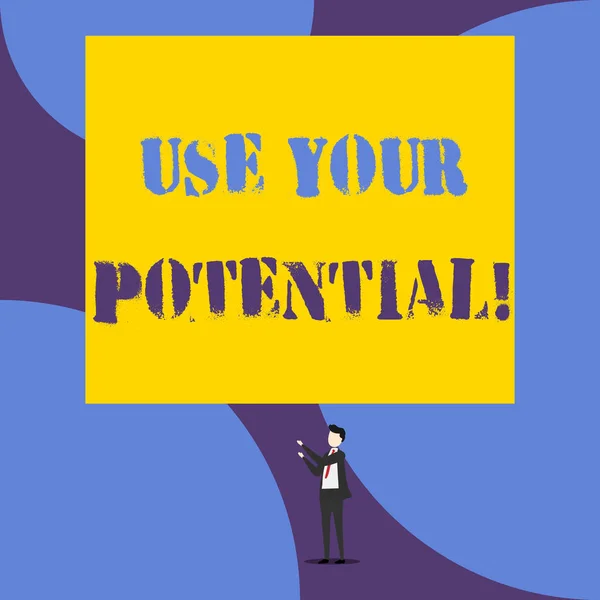 Text sign showing Use Your Potential. Conceptual photo achieve as much natural ability makes possible Isolated view young man standing pointing upwards two hands big rectangle.