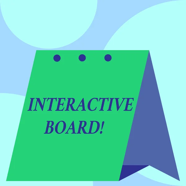 Text sign showing Interactive Board. Conceptual photo standalone touchscreen computer used independently Open big standing calendar Desk monthly planner Geometrical background.