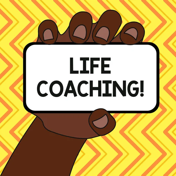 Text sign showing Life Coaching. Conceptual photo demonstrating employed to help showing attain their goals in career Closeup of Smartphone Device Held in Hand with Blank Screen and Text Space.