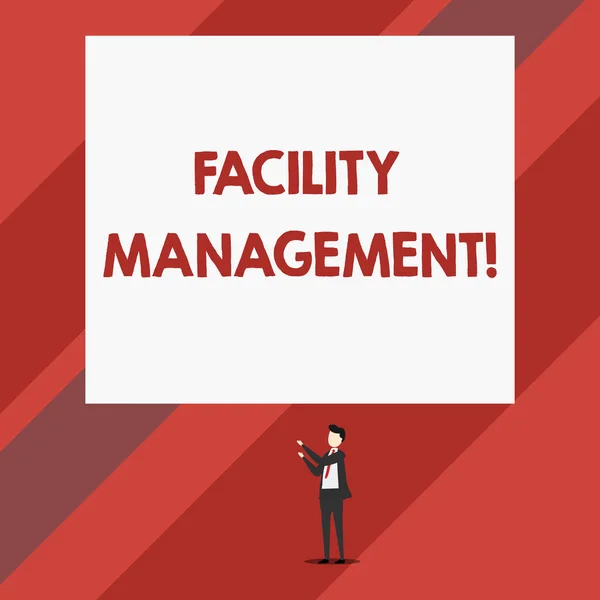 Writing note showing Facility Management. Business photo showcasing Multiple Function Discipline Environmental Maintenance Isolated view man standing pointing upwards two hands big rectangle.