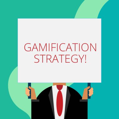 Gamification stratejisi yazma el yazısı metin. Kavram anlamı kullanmak motivasyon için Ödülleri entegre oyun mekaniği sadece adam göğüs giyinmiş koyu takım elbise kravat hiçbir yüz tutan boş büyük dikdörtgen.