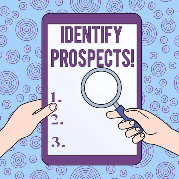 Conceptual hand writing showing Identify Prospects. Business photo showcasing Possible client Ideal Customer Prospective Donors Hands Holding Magnifying Glass Against Switched Off Tablet. — Stock Photo, Image